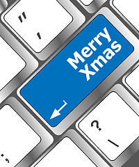 Image showing merry christmas message, keyboard enter key button xmas