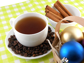 Image showing Christmas decoration with cup of coffee, coffee beans and cinnamon