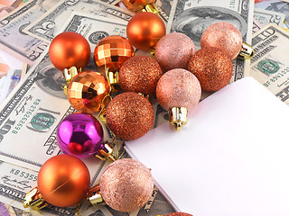 Image showing Dollars notes with christmas balls on it