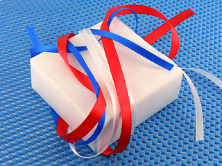 Image showing White gift box with red ribbon bow