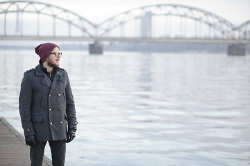 Image showing Young man near the river