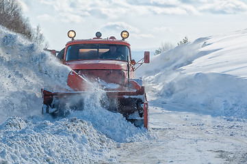 Image showing truck cleaning road in winter