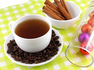 Image showing Christmas decoration with cup of coffee, coffee beans and cinnamon