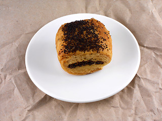 Image showing sweet poppy seed cake on white plate