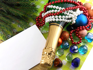 Image showing champagne bottle, diamonds and stones, christmas baubles, Merry Christmas and Happy New Year