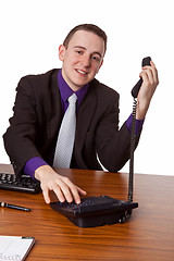 Image showing Businessman calling up