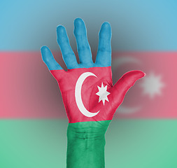 Image showing Palm of a woman hand, painted with flag