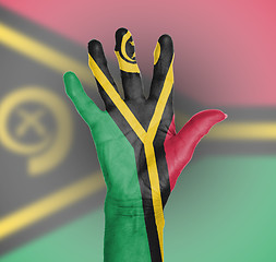 Image showing Palm of a woman hand, painted with flag