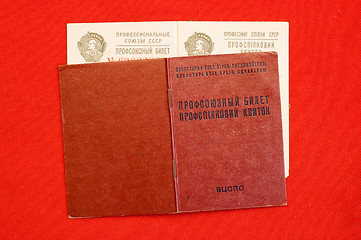 Image showing union card of USSR over red