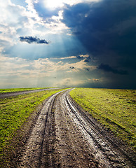 Image showing dirty road under dramatic sky