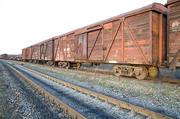 Image showing old rusty train wagons on railway