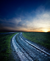 Image showing dirty way in sunset after rain