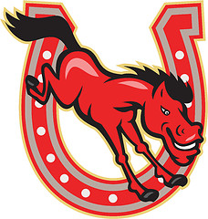 Image showing Red Horse Jump Over Horseshoe 