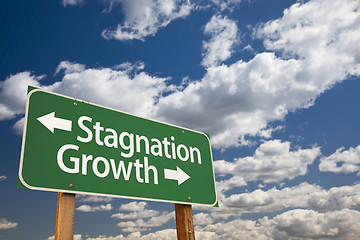 Image showing Stagnation or Growth Green Road Sign Over Clouds and Sky