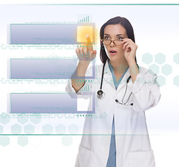 Image showing Female Doctor or Nurse Pushing Blank Button on Panel