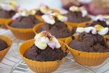 Image showing Homemade chocolate brownie in yelloe cup 