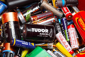 Image showing Assorted Household Batteries in garbage can