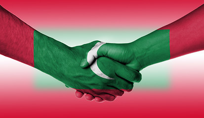 Image showing Man and woman shaking hands