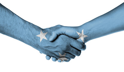 Image showing Man and woman shaking hands