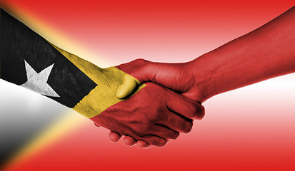 Image showing Man and woman shaking hands