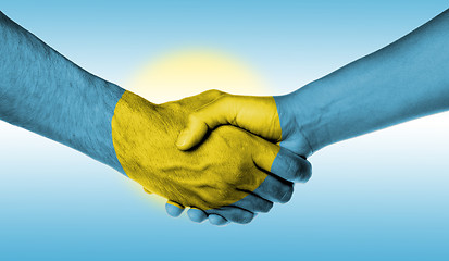 Image showing Man and woman shaking hands