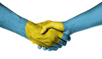 Image showing Man and woman shaking hands