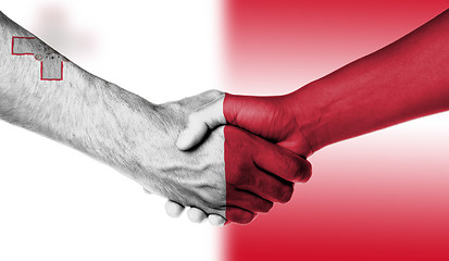 Image showing Man and woman shaking hands