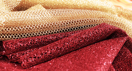 Image showing Golden and red fabric