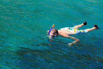 Image showing Young man is snorkeling