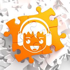 Image showing Happy Boy with Headphones Icon on Orange Puzzle.