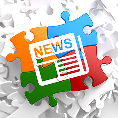 Image showing Newspaper with News Title on Multicolor Puzzle.