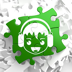 Image showing Happy Boy with Headphones Icon on Green Puzzle.