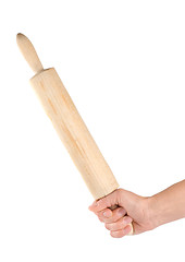 Image showing Rolling pin in a human hand