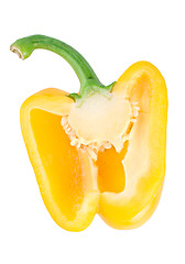 Image showing Cutting the yellow pepper isolated