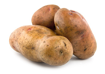 Image showing Three potatoes isolated