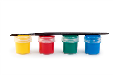 Image showing Gouache paint cans and brush