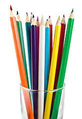 Image showing A glass cup with pencils