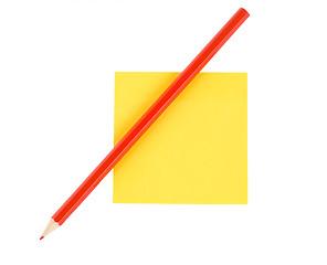 Image showing Red pencil on paper isolated