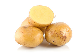 Image showing Four potatoes isolated
