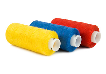 Image showing Three spools of threads