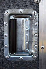 Image showing Metallic rivets of a road case