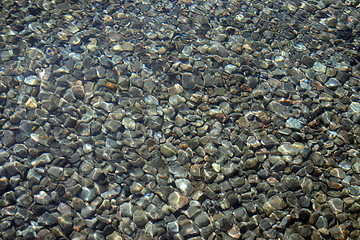 Image showing Pebbly bottom seen through transparent water