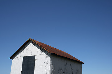 Image showing White hut and the blue sky