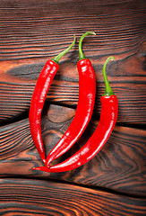 Image showing Three red chili peppers