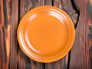 Image showing Plate on a wooden table