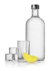 Image showing Bottle of vodka and lemon