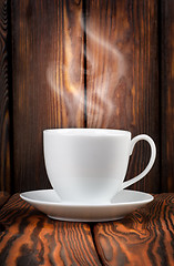 Image showing White cup with steaming hot drink