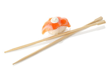 Image showing Wooden chopsticks and sushi