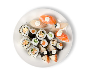 Image showing Sushi and rolls in a plate isolated