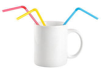 Image showing White cup with a drinking straw